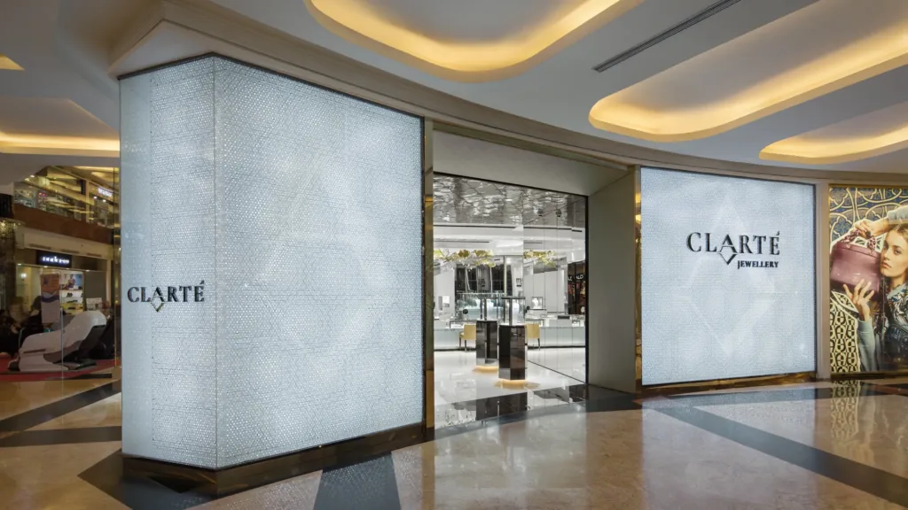 Clarté Jewelry — Lattice light-box façade